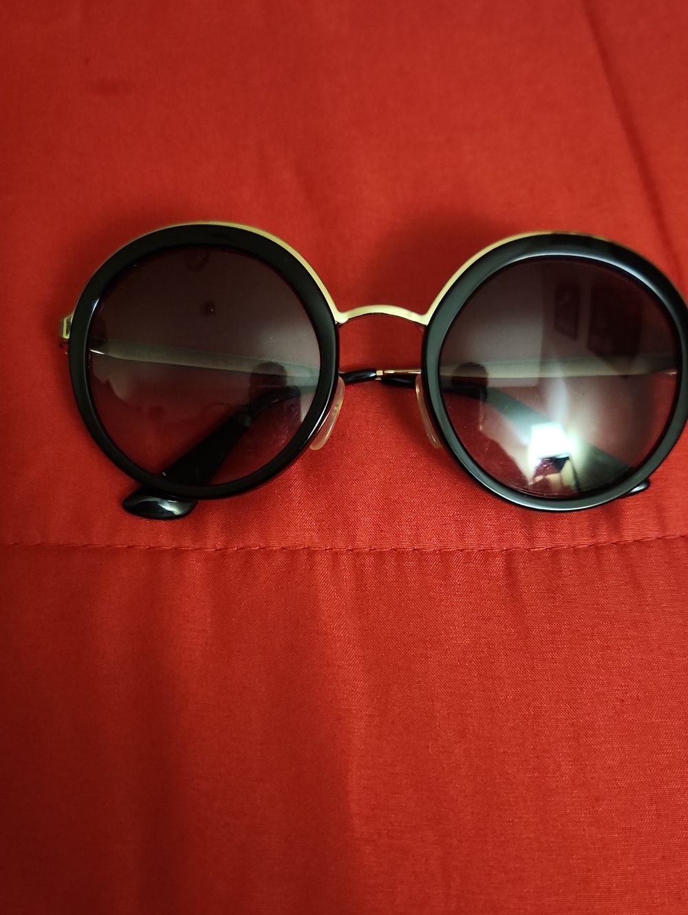 PRADA Round Black and Gold Women's Sunglasses